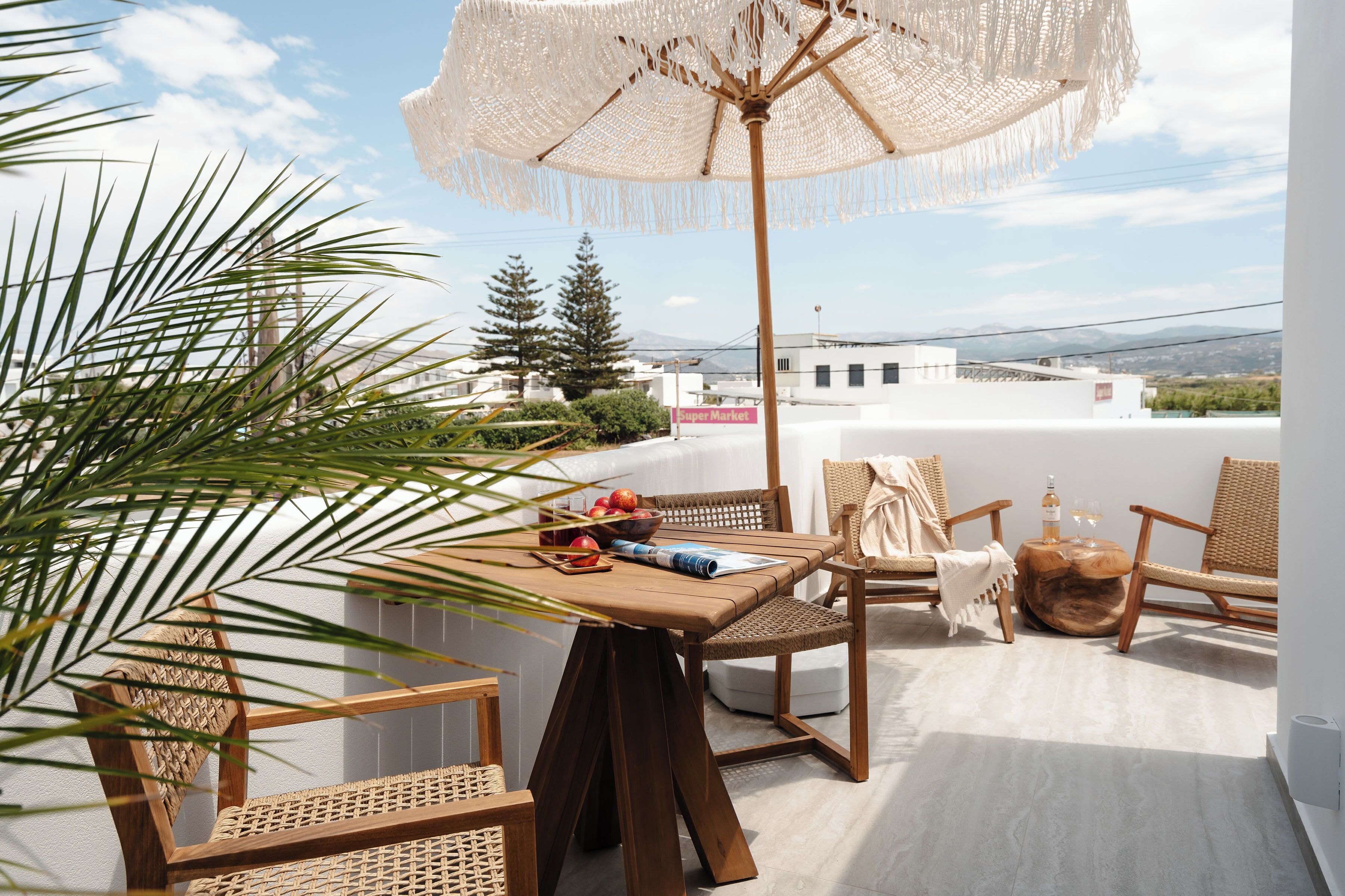 Suíte premium, várias camas, vista para o mar, ao lado da praia | Terraço/pátio