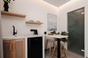 Premium Suite, Multiple Beds, Sea View, Beachside | Private kitchen | Mini-fridge, espresso maker, coffee/tea maker, electric kettle - Phaistos Suites  (Naxos)
