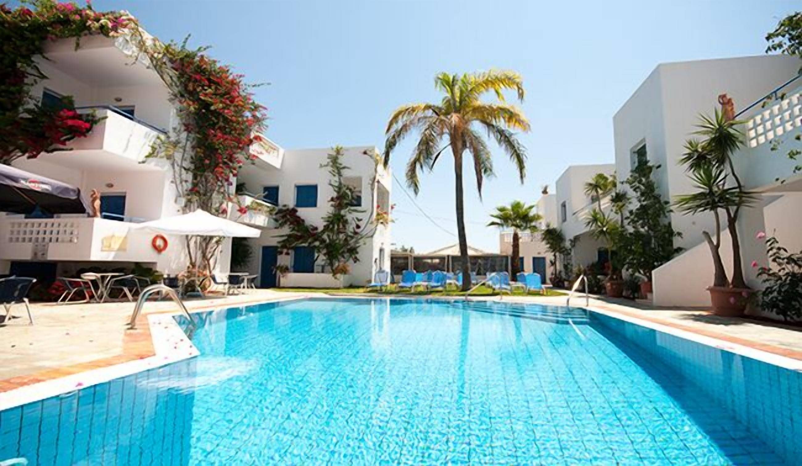 Seasonal outdoor pool, open 8:30 AM to 7:30 PM, pool umbrellas