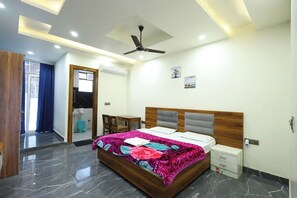 Deluxe Room | Egyptian cotton sheets, premium bedding, down comforters - Radha krishna spiritual stay  (Vrindavan)