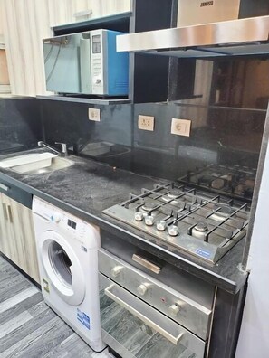 Fridge, microwave, oven, stovetop