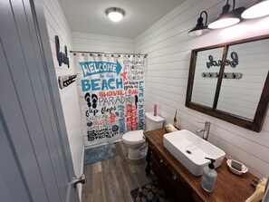 Hair dryer, towels, soap, toilet paper