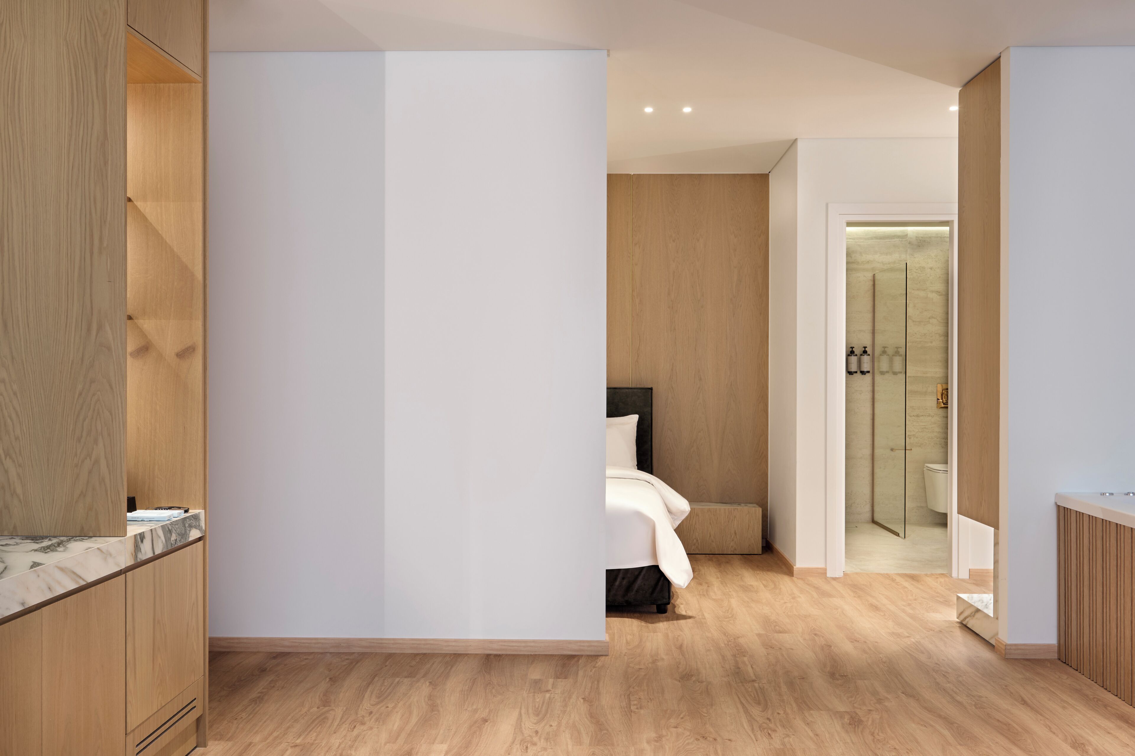 Suite | In-room safe, desk, laptop workspace, blackout curtains