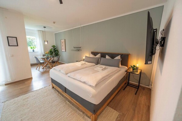 1 habitación, tabla de planchar con plancha, wifi y ropa de cama 