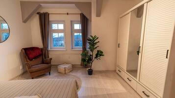 1 chambre, fer et planche Ă repasser, Wi-Fi, draps fournis