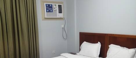 Room, Multiple Beds, Non Smoking, City View | Laptop workspace, free WiFi