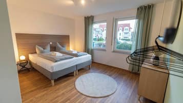 1 dormitorio, tabla de planchar con plancha, wifi y ropa de cama