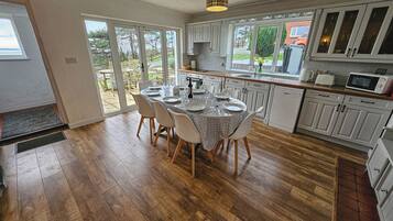Microwave, oven, dining tables