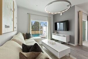 Townhome, 6 Bedrooms | Living area | Smart TV