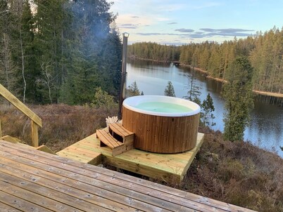 Holiday home Tived - directly on lake, sauna, boat, hot tub