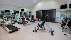 A gym with treadmills, elliptical machines, and free weights. - Free Breakfast. Shared Pool & Hot Tub. Studio Near Texas Tech University & University Medical Center. (Lubbock)