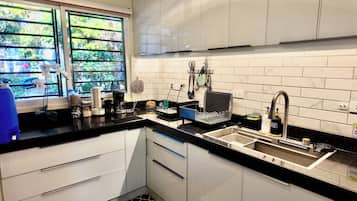 Fridge, microwave, stovetop, coffee/tea maker