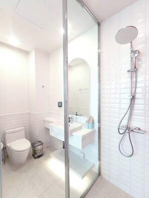 Hair dryer, bidet, towels, soap