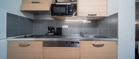 Fridge, microwave, dishwasher, coffee/tea maker