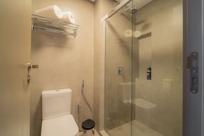 Shower, free toiletries, towels, soap