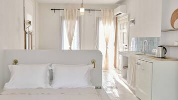 Comfort Room, Patio, Garden View | Desk, iron/ironing board, free WiFi, bed sheets