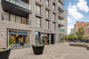 Stylish building with a brick facade and large windows.