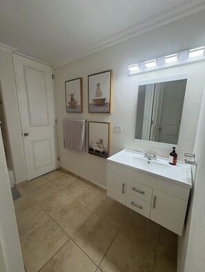 Shower, towels, soap, toilet paper