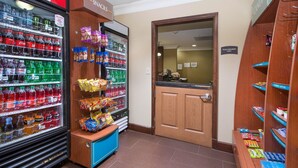 A vending area with various snacks and drinks. - King Suite Near Bush Field Airport | Free Daily Breakfast (Augusta)