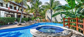 Modern Split-Level 2-Bedroom Condo with Pools, Terrace & Easy Beach Access