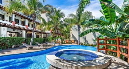 Modern Split-Level 2-Bedroom Condo with Pools, Terrace & Easy Beach Access