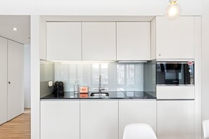 Fridge, microwave, dishwasher, coffee/tea maker