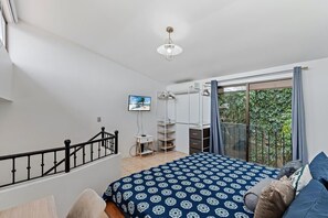 Loft, Balcony | 2 bedrooms, free WiFi - Bright and Spacious Loft-Style Apartment a Five-Minute Walk to the Beach (Sardinal)
