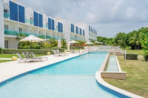 Outdoor pool - Cozy 1-bedroom condo with direct pool access, AC & Wi-Fi in Pleasant Punta Cana (Punta Cana)