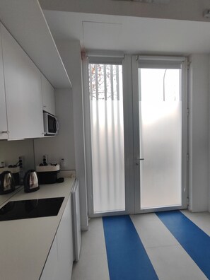 Fridge, microwave, coffee/tea maker, toaster