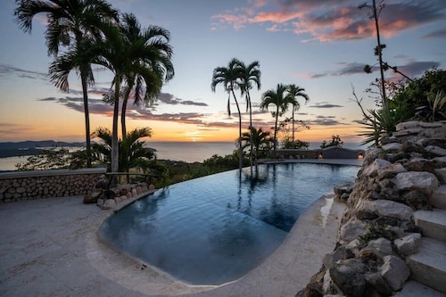 Stunning Mountaintop Property with Stylish Main Home, Private Guesthouse & Infinity Pool