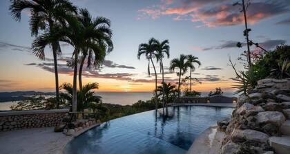 Stunning Mountaintop Property with Stylish Main Home, Private Guesthouse & Infinity Pool