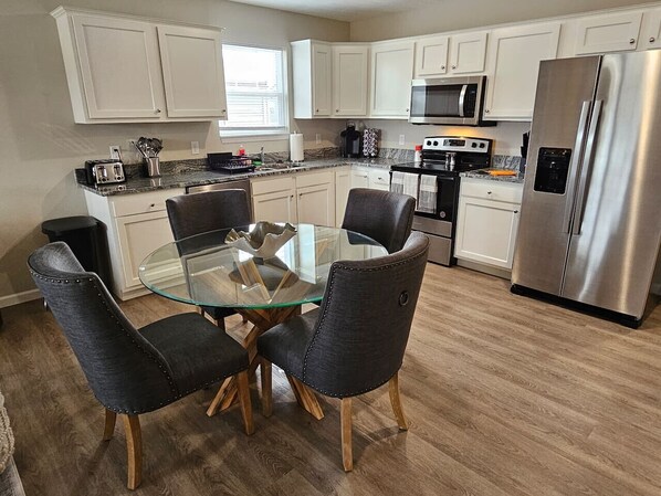Coffee/tea maker, fridge, microwave, oven