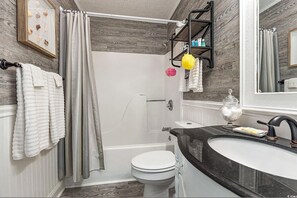 Hair dryer, towels, soap, shampoo