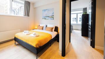 Apartamento, 3 quartos | Área de estar
