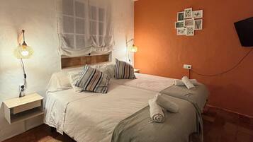 2 dormitorios, tabla de planchar con plancha, wifi gratis y ropa de cama