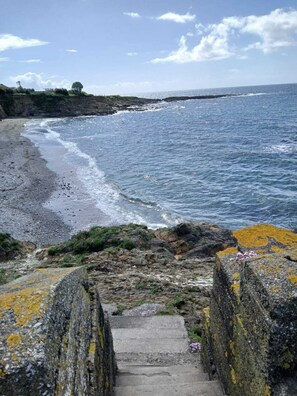 On the beach, sun loungers