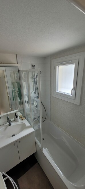 Hair dryer, towels, toilet paper