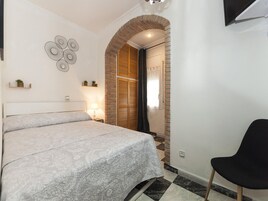 Apartamento | 2 dormitorios y tabla de planchar con plancha