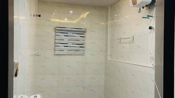 Family Apartment, Balcony, City View | Bathroom | Free toiletries, hair dryer, towels, soap