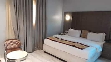 Family Apartment, Balcony, City View | 1 bedroom, desk, laptop workspace, blackout drapes