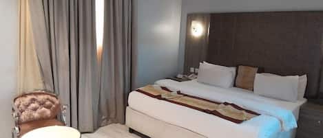 1 bedroom, desk, laptop workspace, blackout curtains