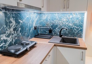 Junior Suite with Panoramic View | Private kitchen | Mini-fridge, microwave, stovetop, cookware/dishes/utensils