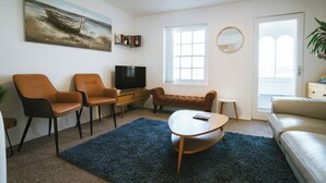 Leilighet, sjøutsikt | Oppholdsområde