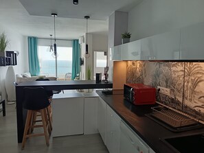 Fridge, microwave, dishwasher, coffee/tea maker