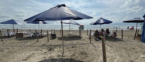 On the beach, beach towels
