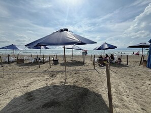 On the beach, beach towels