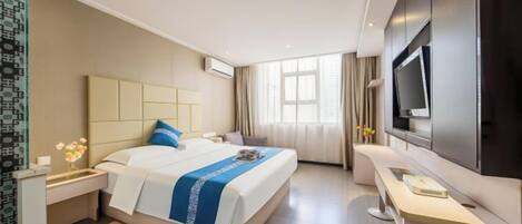 A hotel room with a bed, bedside table, TV, and a large window.
