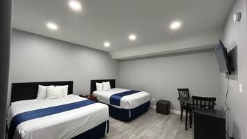 Huone, 2 keskisuurta parisänkyä, tupakointi kielletty | Ilmainen Wi-Fi, vuodevaatteet