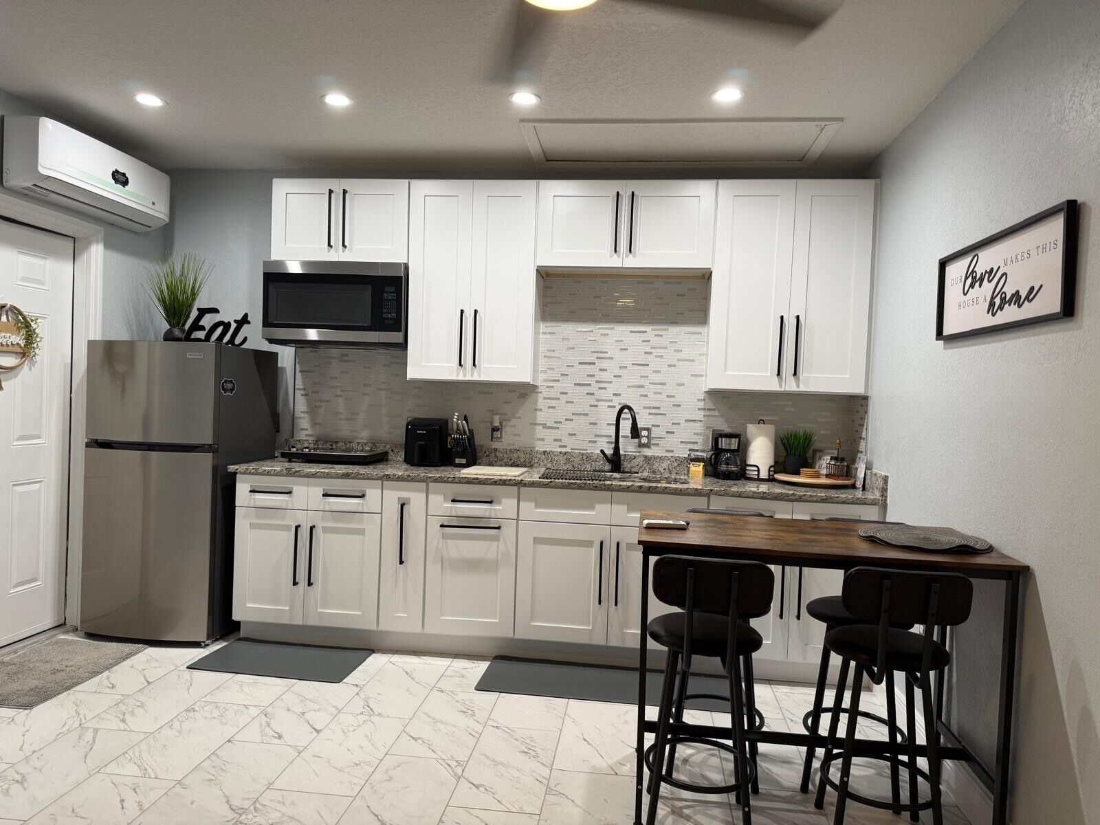 Fridge, microwave, stovetop, coffee/tea maker