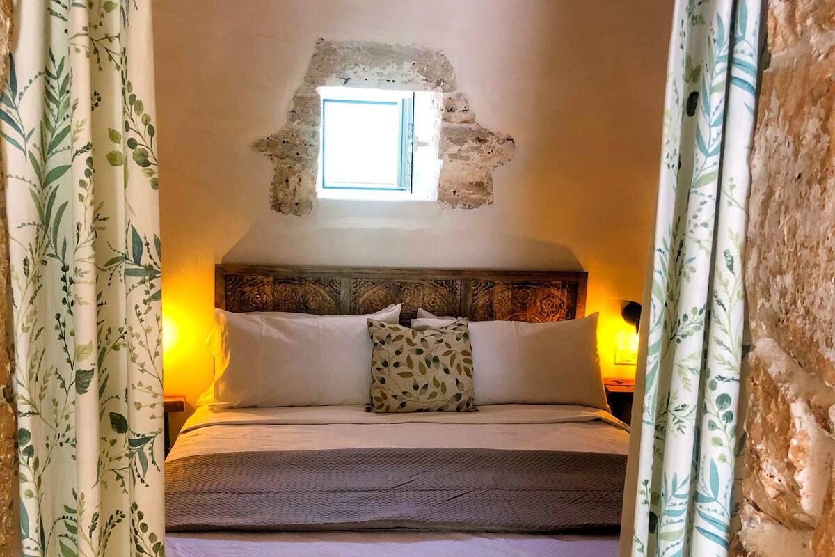 Luxury Suite, Garden View | 1 bedroom, iron/ironing board, free WiFi